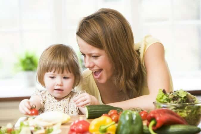 Child Eating Vegetables