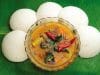 Idli Sambar on a banana leaf