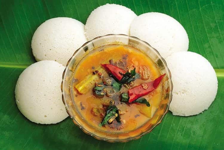 Idli Sambar on a banana leaf