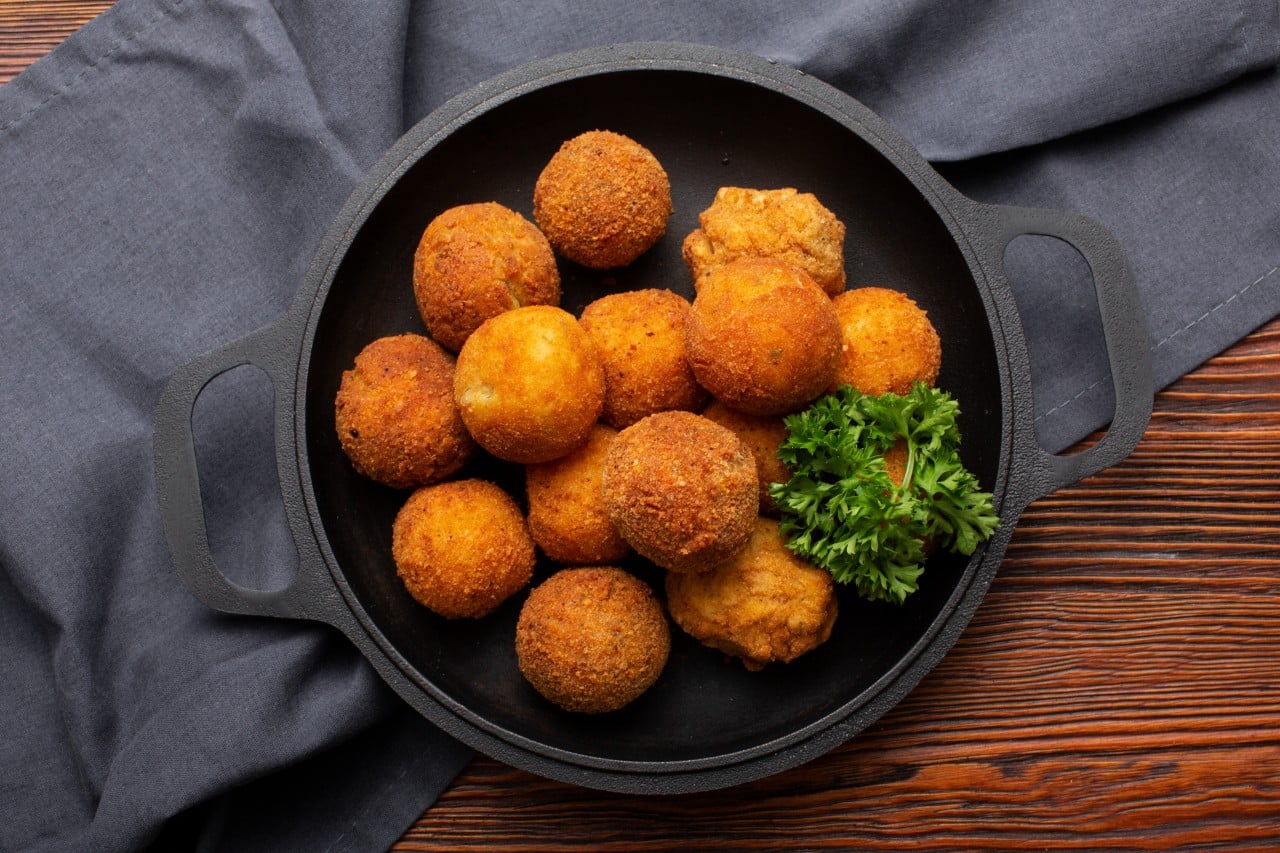 19 Must-Try Monsoon Recipes for Perfect Rainy Evenings 10 Cheese Corn Balls in a serving dish