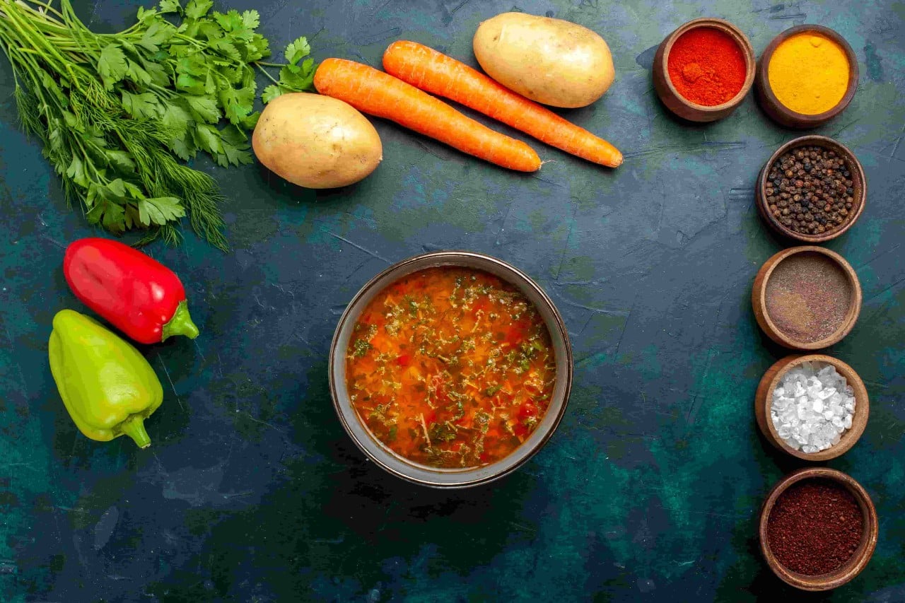 What Are the 10 Tips on How to Make Soup at Home Like a Pro? 1 common soup ingredients kept on a table