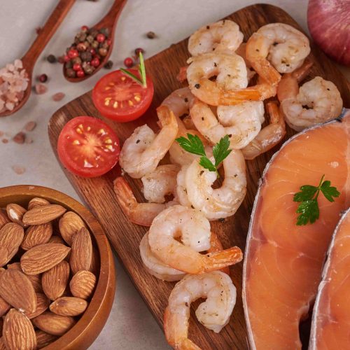 Seafood Benefits: What to Eat and Easy Ways to Cook It? 22 salmon and prawns on a table with spices