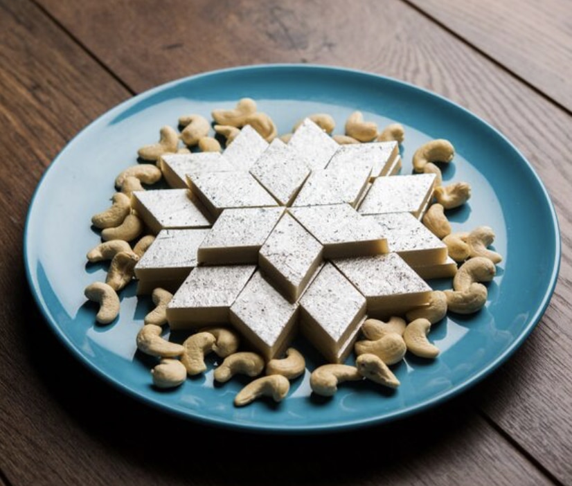What Are the 20 Must-Try Indian Dessert Recipes? 15 kaju katli on a plate