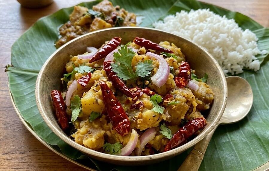 What are the Best Manipuri Cuisine Dishes to Try? 8 Alu Kangmet mashed potatoes with red chillies and herbs served in Manipuri style