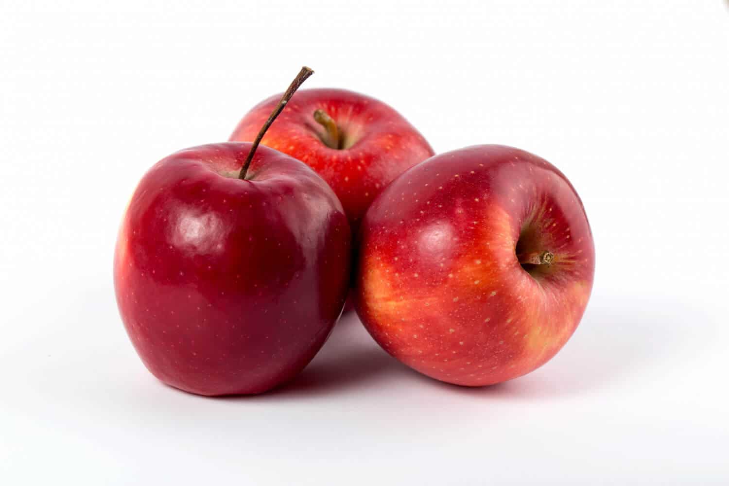 Which Heart Healthy Foods Should You Eat Daily? 13 Apples placed in simple background