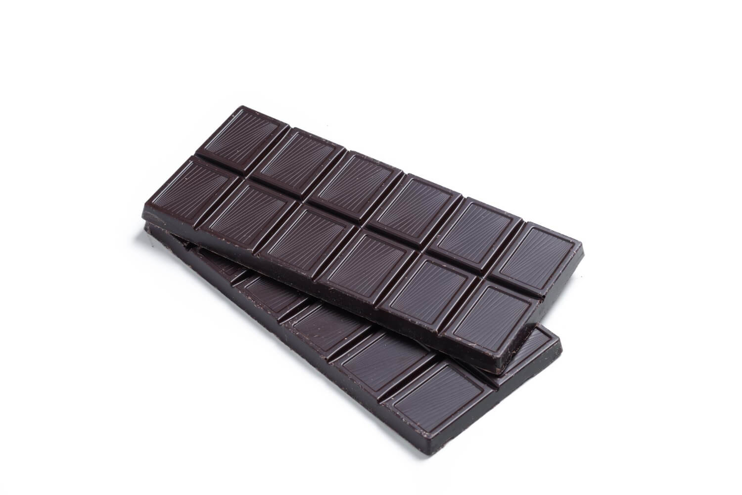 Which Heart Healthy Foods Should You Eat Daily? 19 Dark chocolate bars placed on a plain background