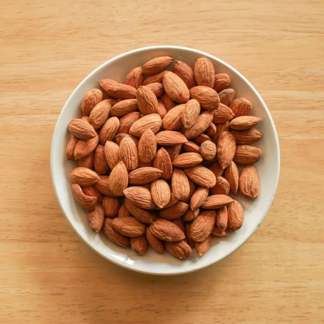 What are the Best Cholesterol-Reducing Foods for the Heart? 5 Raw almonds rich in healthy fats that support heart health