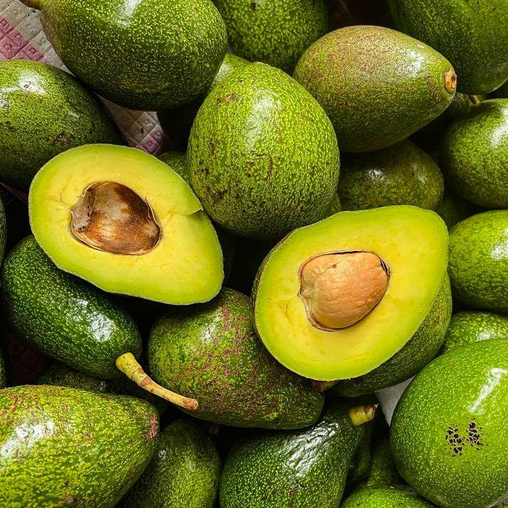 What are the Best Cholesterol-Reducing Foods for the Heart? 3 Ripe avocado slices rich in healthy fats for improving cholesterol