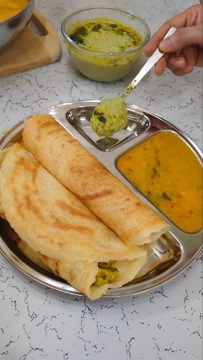 Where Can You Find the Best South Indian Food? 1 Crispy South Indian dosa served with sambar and coconut chutney