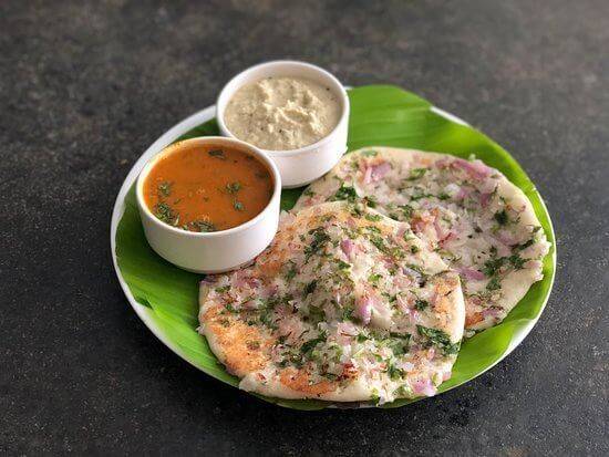 Where Can You Find the Best South Indian Food? 6 Soft uttapam topped with onions and vegetables served with chutney