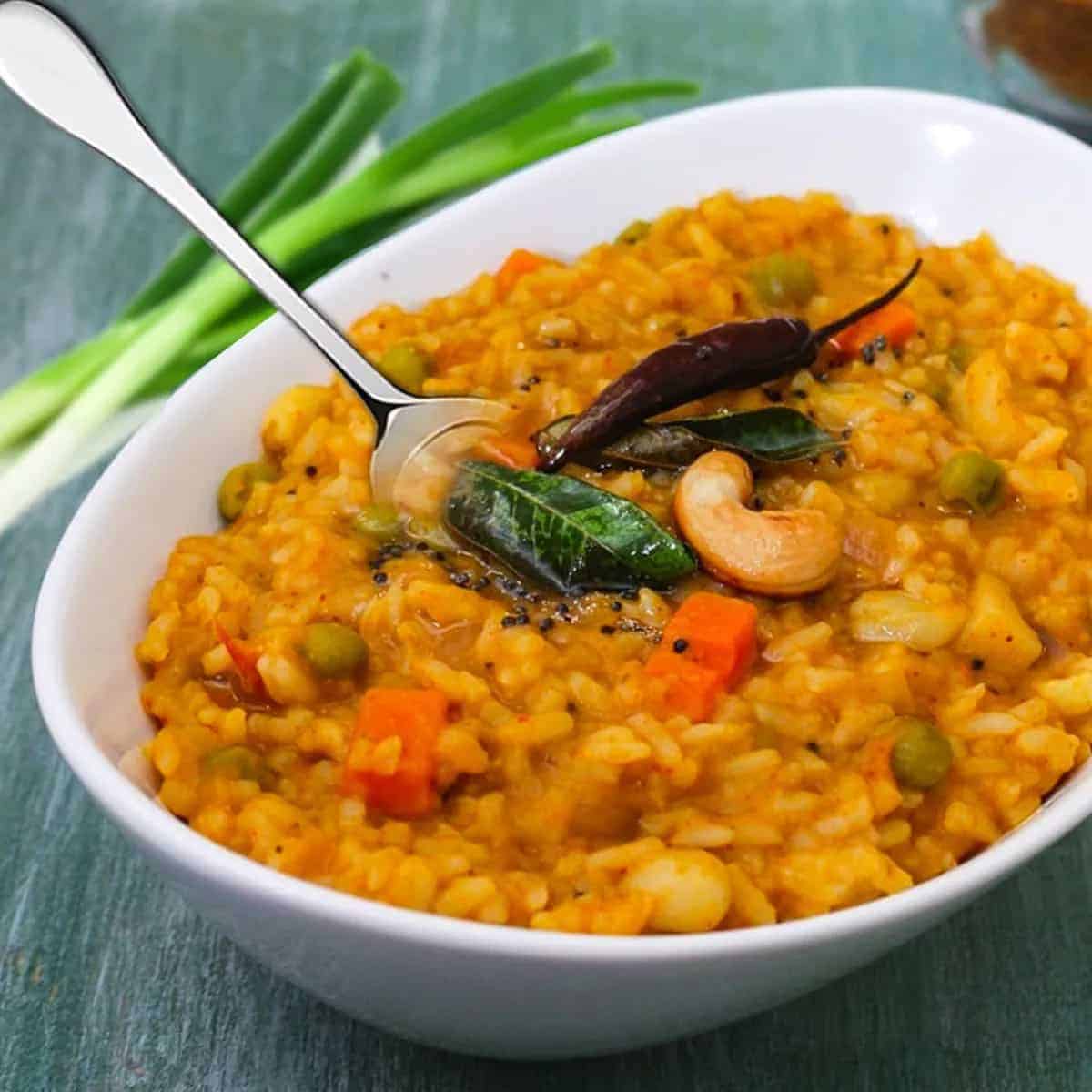 Where Can You Find the Best South Indian Food? 11 Spicy bisi bele bath with vegetables served hot in a bowl