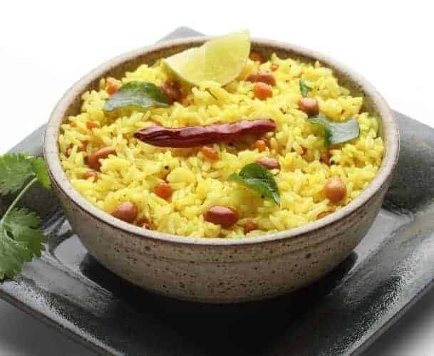 Where Can You Find the Best South Indian Food? 9 Tangy lemon rice with peanuts and curry leaves served in a bowl