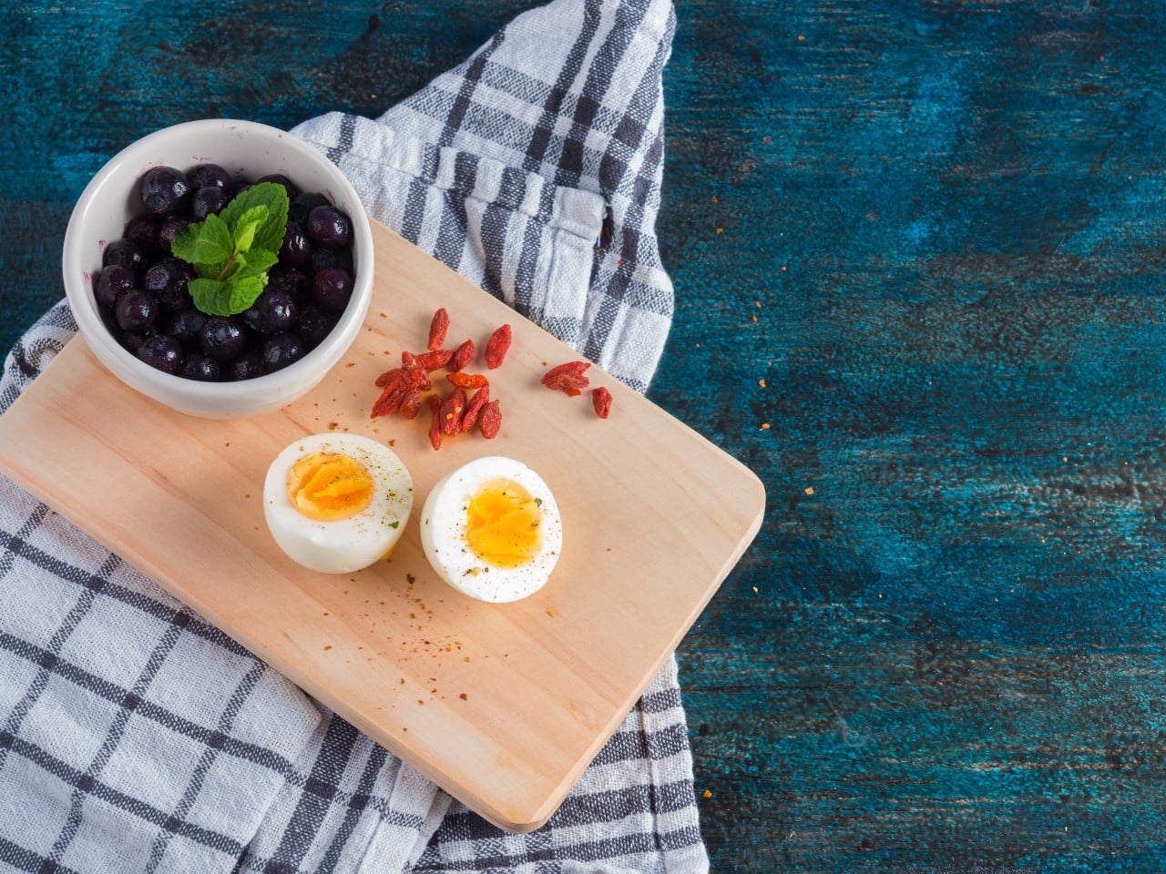 What Are the Best Food to Increase Hemoglobin For Diabetic Patient? 30 boiled egg with berries wooden board