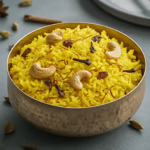 What Is Odisha’s Famous Food? 20 Must-Try Dishes 3 Kanika sweet rice dish with cashews raisins and saffron served in a bowl