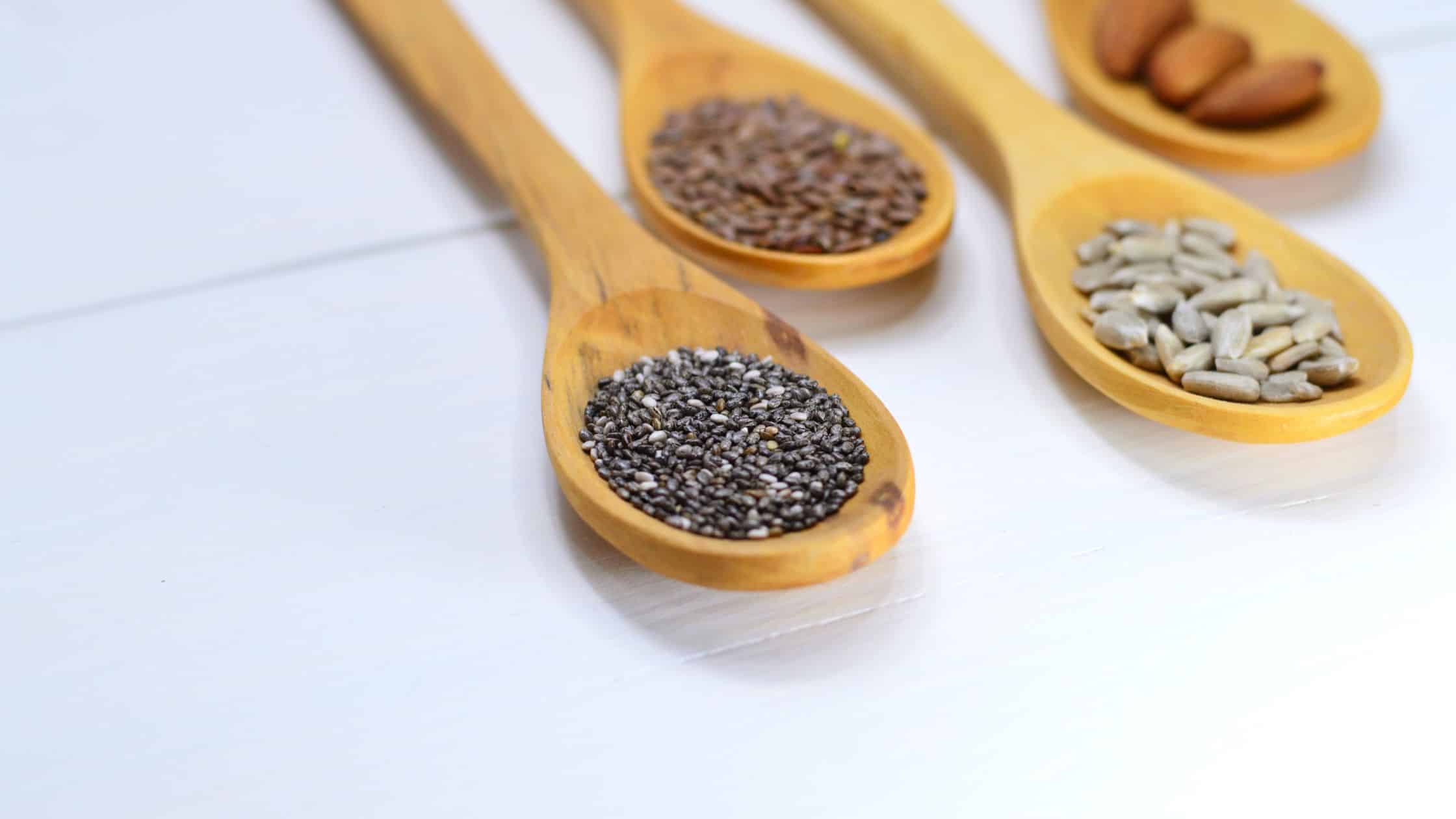 Different seeds on spoons