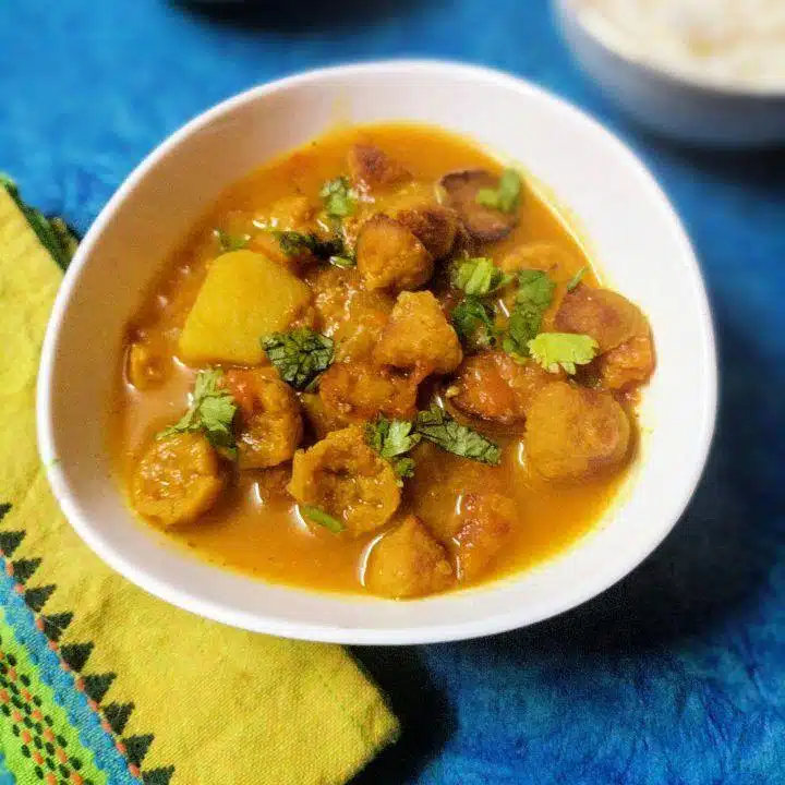 What Are the Most Popular Rajasthan Famous Food Dishes? 16 Aloo Mangodi traditional Rajasthani curry with potatoes and sun dried lentil nuggets cooked with spices