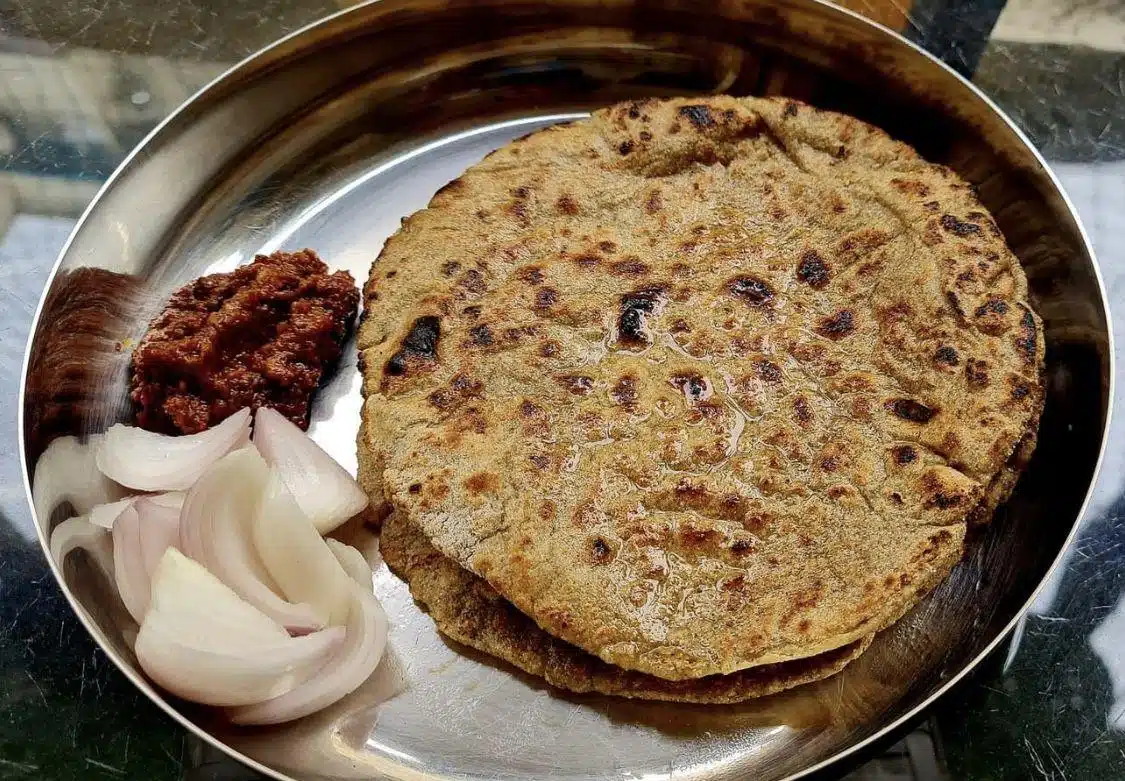 What Are the Most Popular Rajasthan Famous Food Dishes? 6 Bajra Ki Roti with Lehsun Chutney traditional Rajasthani millet flatbread served with spicy garlic chutney