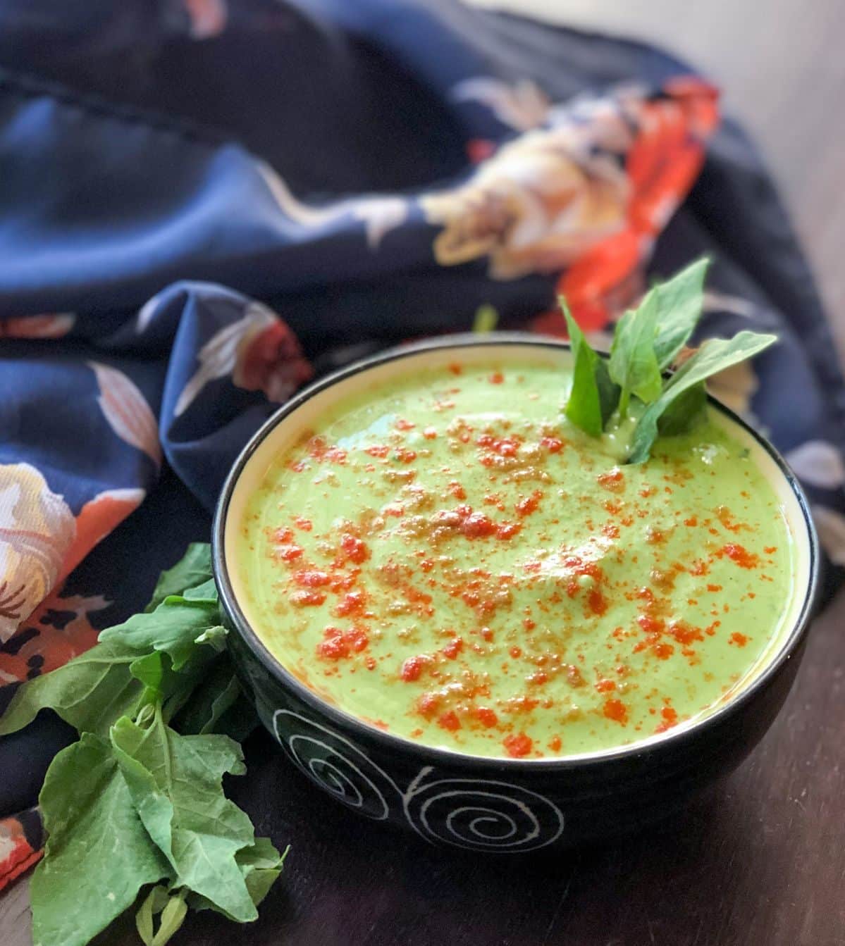 What Are the Famous Food of Haryana You Must Try? 9 Bathua raita with yogurt and bathua leaves served in a bowl
