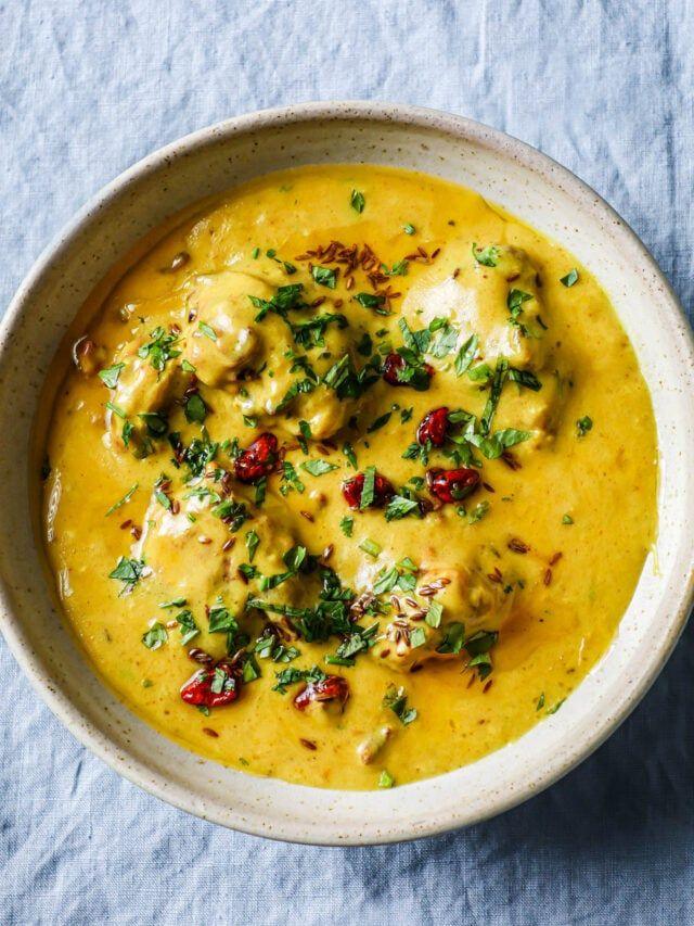 What Are the Famous Food of Haryana You Must Try? 7 Kadhi pakora served in a bowl with yoghurt curry and gram flour fritters traditional Haryanvi dish
