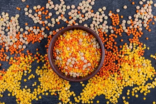 Different lentils in a brown bowl