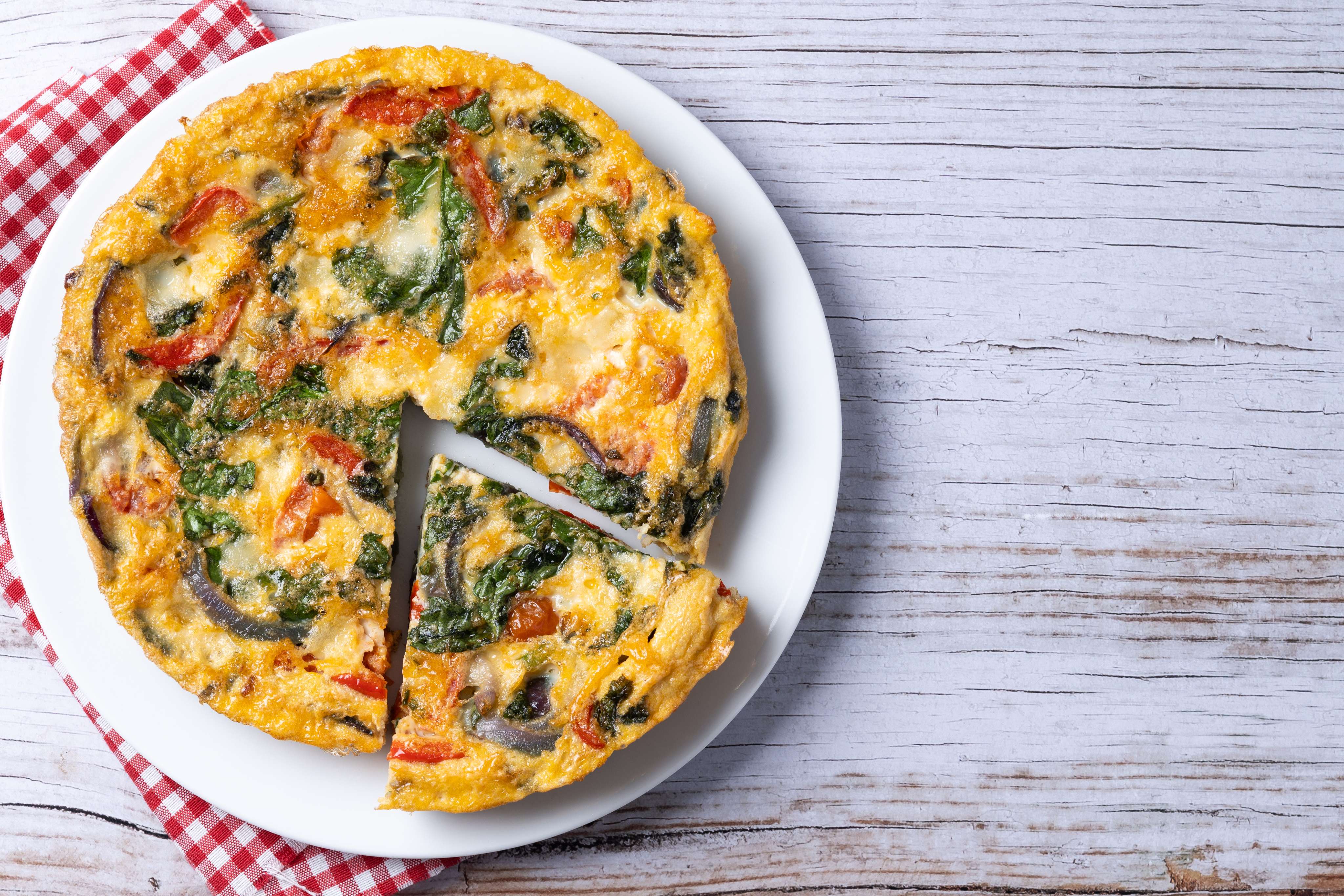 Frittata made with tomato spinach and egg
