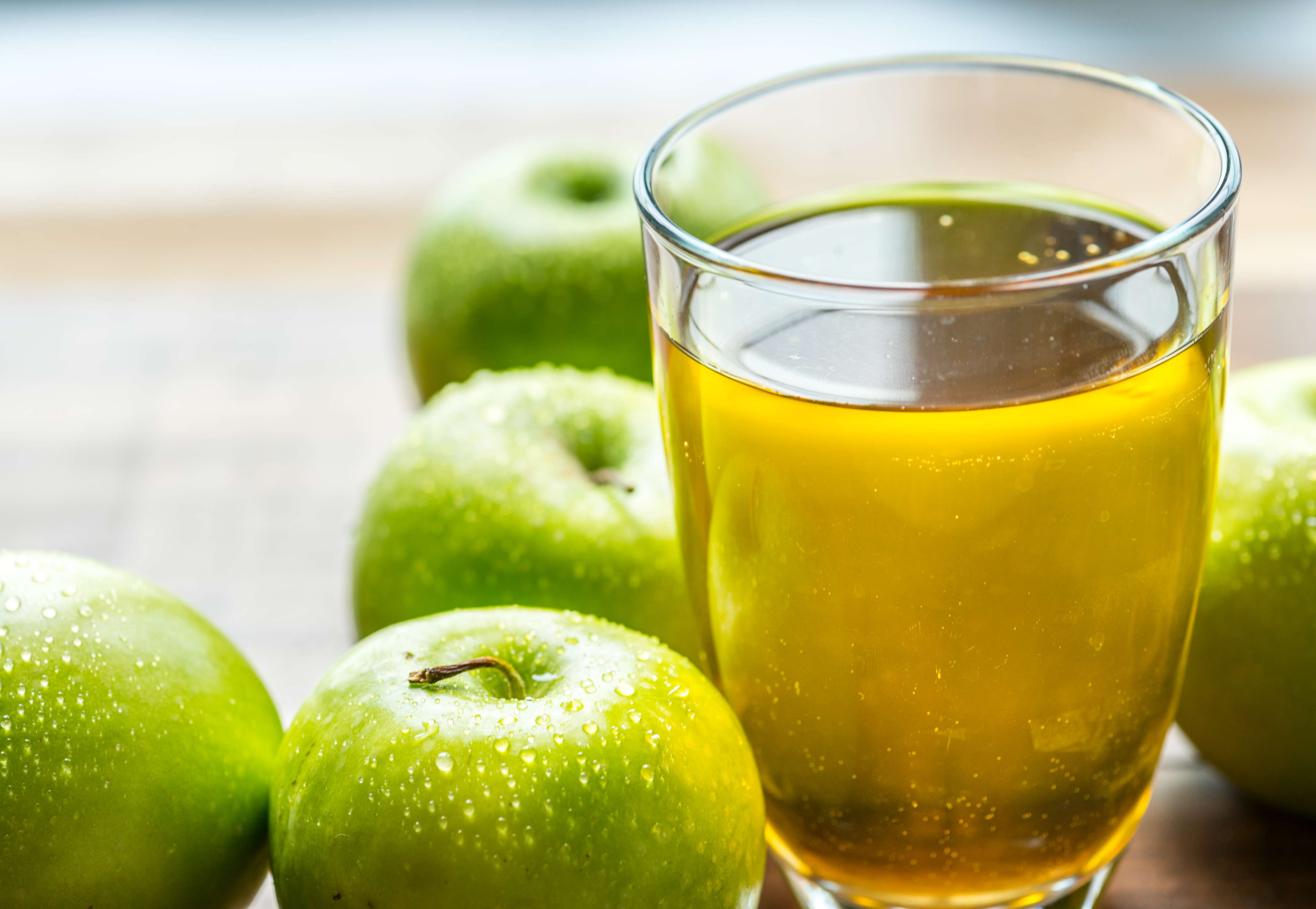 Glass of green apple juice