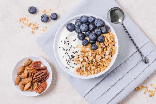 Greek yogurt topped with nuts and fruits