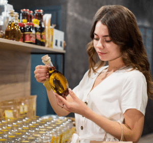 Photography of a woman storing olive oil