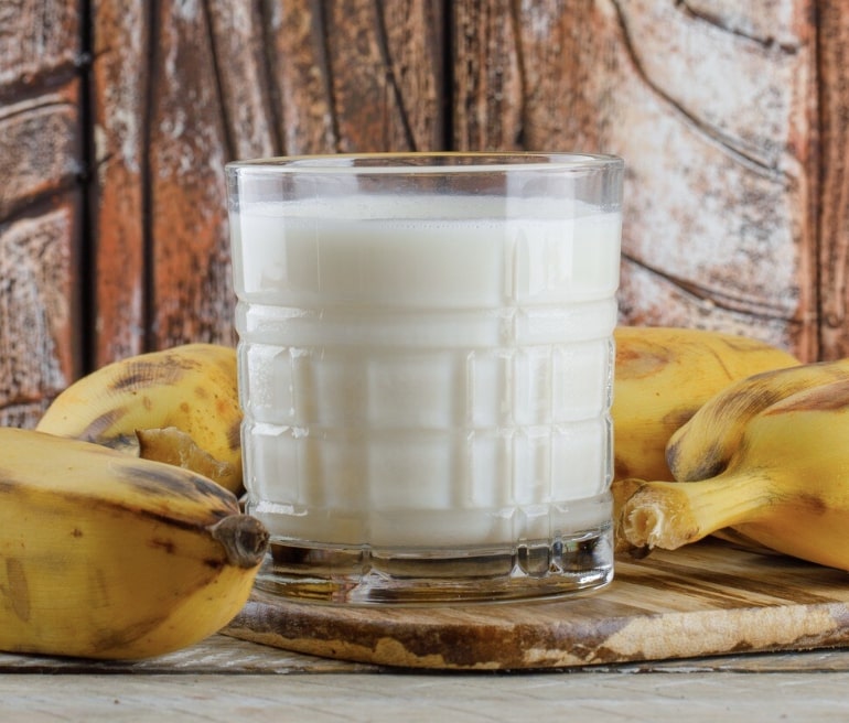 Banana lassi in a glass