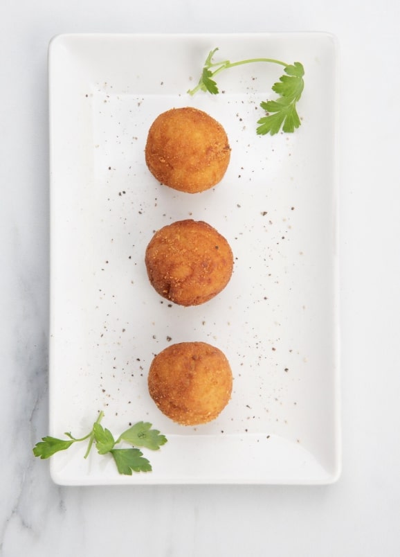 cheese corn balls on a plate