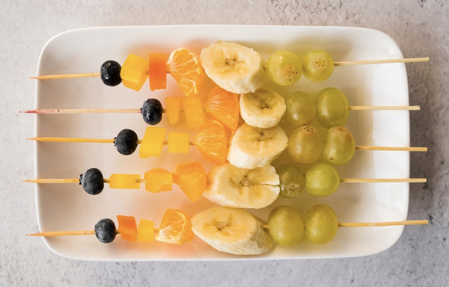 different fruits on a skewer 
