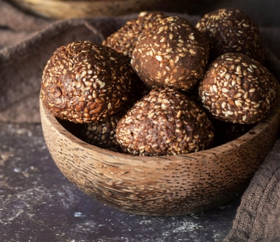 How to Introduce Weight Gain Foods for Kids at Home? 13 energy balls in a bowl