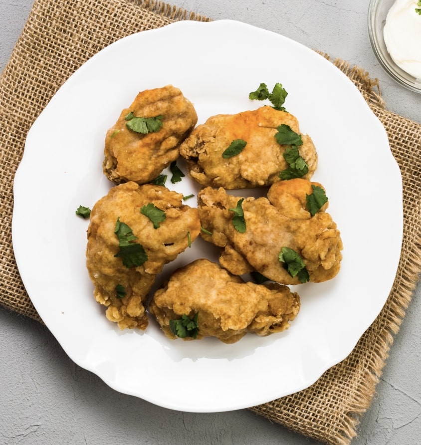 kadhi pakora on a plate