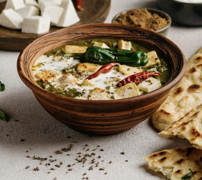 methi malai paneer in a bowl