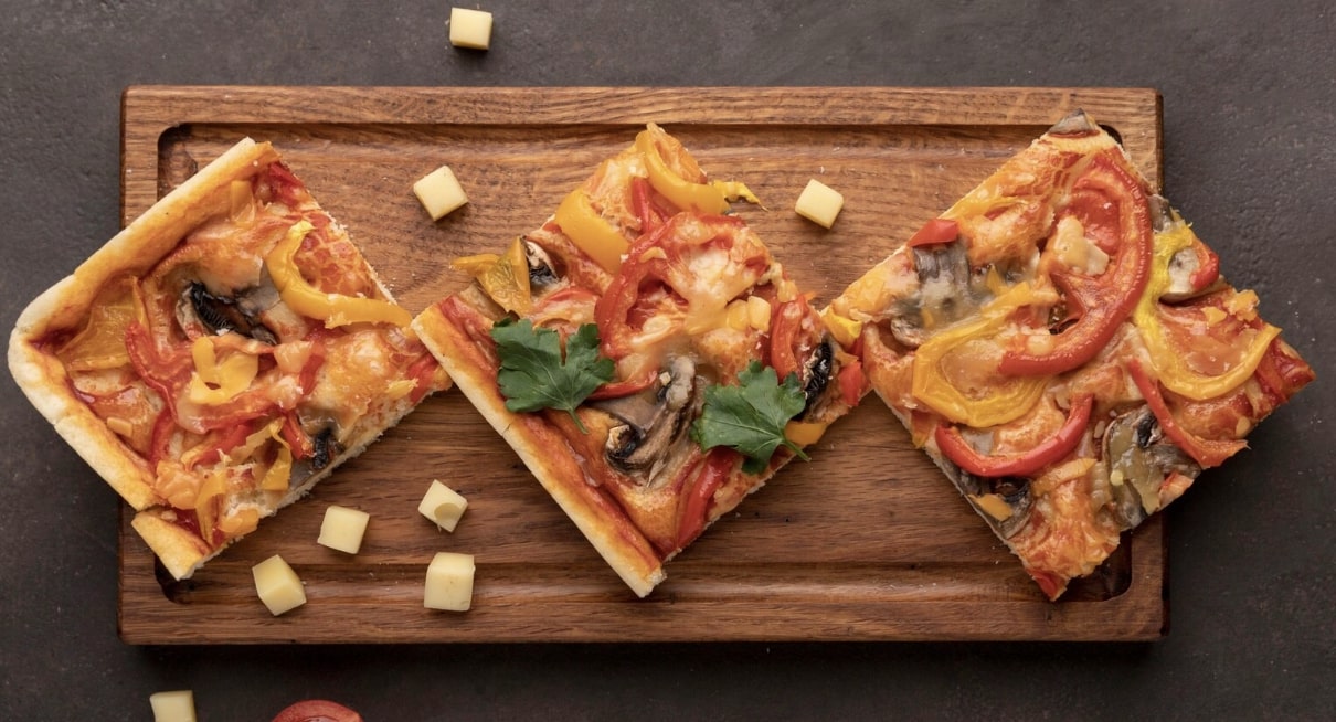 pizza slices on a wooden tray