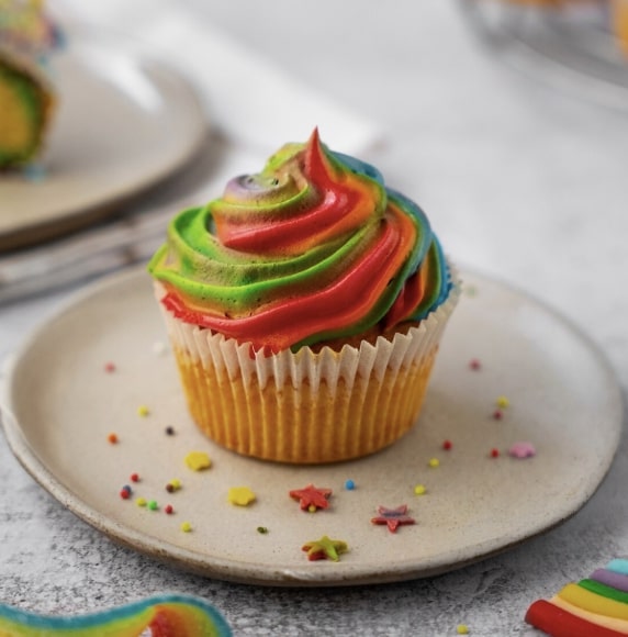 rainbow cupcake on a plate