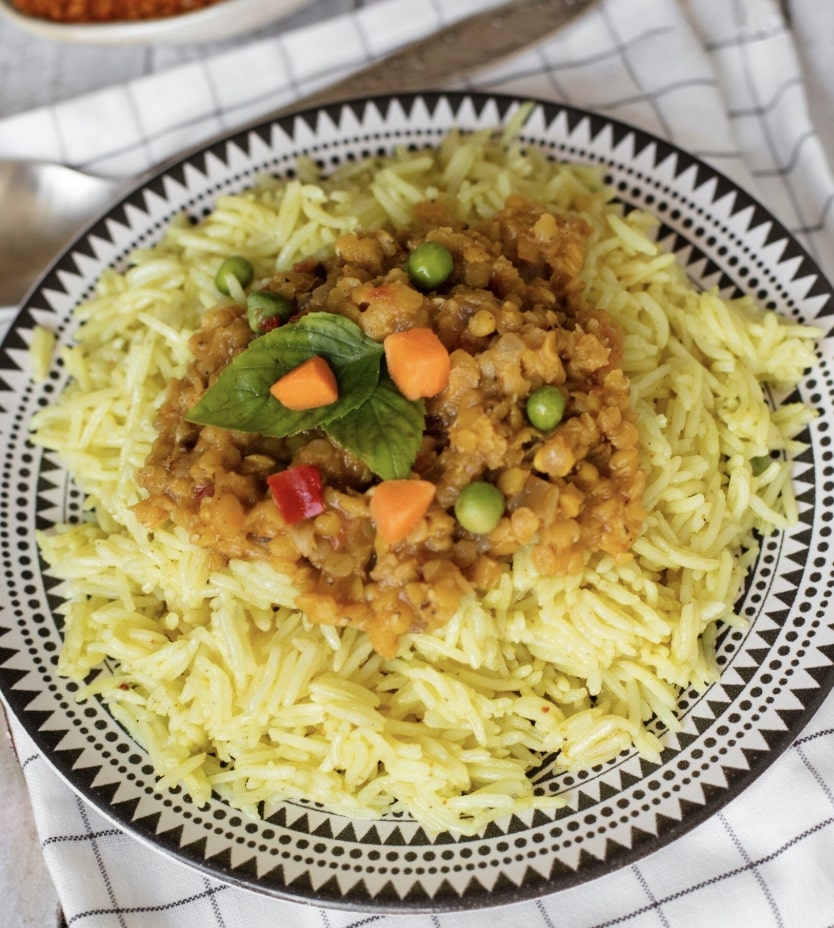 steamed vegetable pulao in a plate
