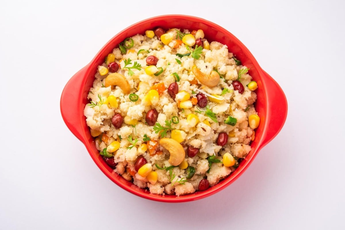What are the 10 Best Ideas for Cooking Without Fridge? 5 A bowl of vegetable upma garnished with cashews coriander green chilies and mixed vegetables like corn and peanuts