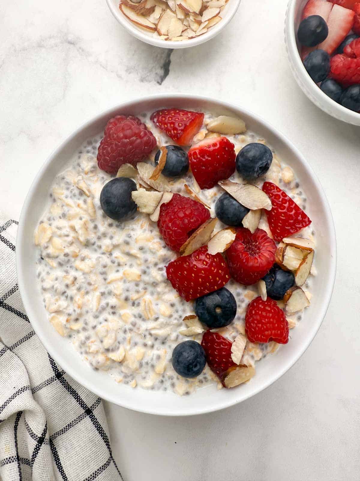 What Are Dietary Fats and Which Types Are Healthy? 16 Chia seed overnight oats topped with almonds berries and honey in a glass jar