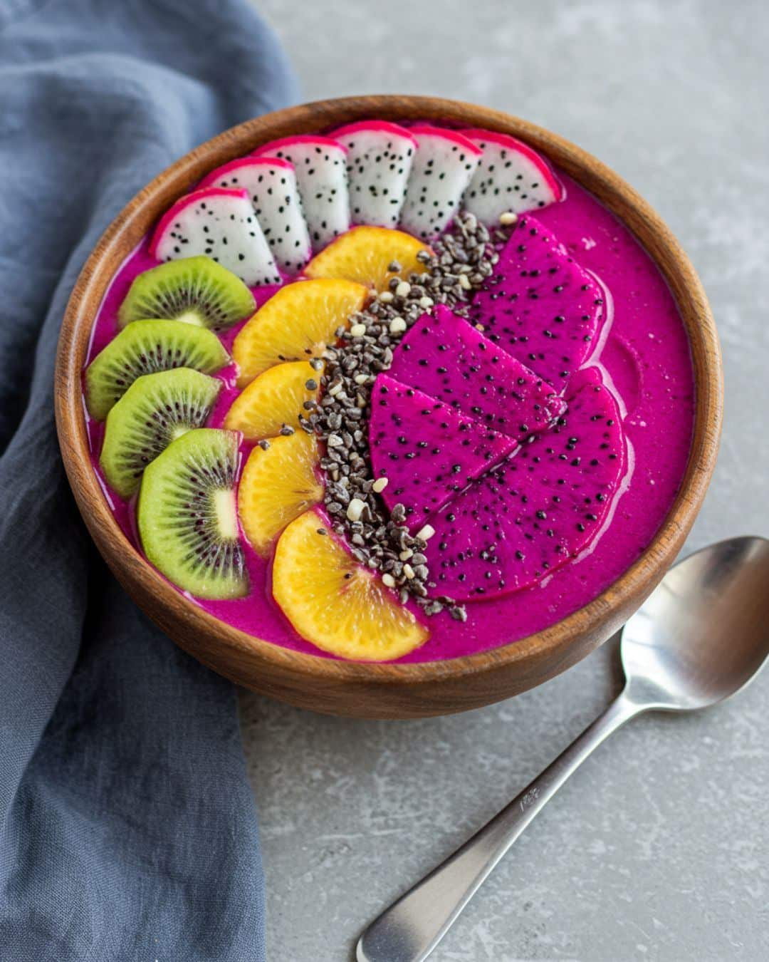How to Make Smoothies at Home With Simple Ingredients? 8 Dragon fruit smoothie with hibiscus banana and coconut water in a vibrant pink glass