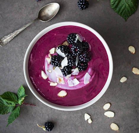 What Are the Health Benefits of Beetroot in Daily Diets? 20 Beetroot smoothie bowl topped with granola chia seeds berries and sliced fruits