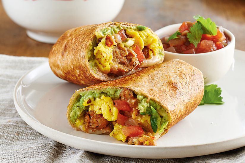 What Are the 25 Best Brunch Dishes for Weekend Meals? 41 Breakfast burrito served with salsa for a filling brunch meal