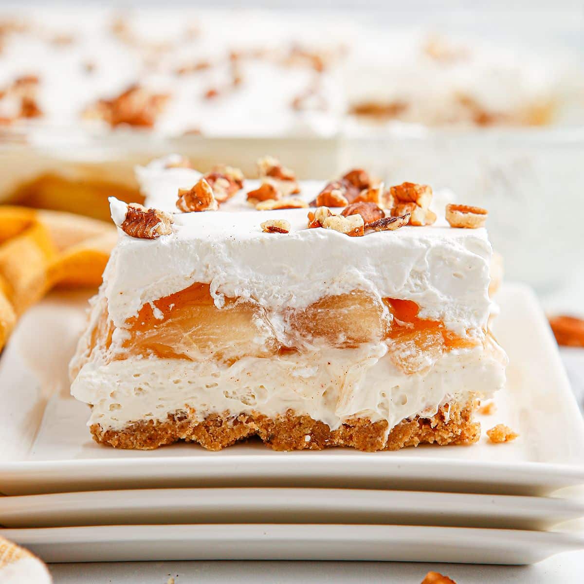 What Are the 25 Best Brunch Dishes for Weekend Meals? 44 Creamy apple delight dessert topped with nuts for a sweet brunch dish