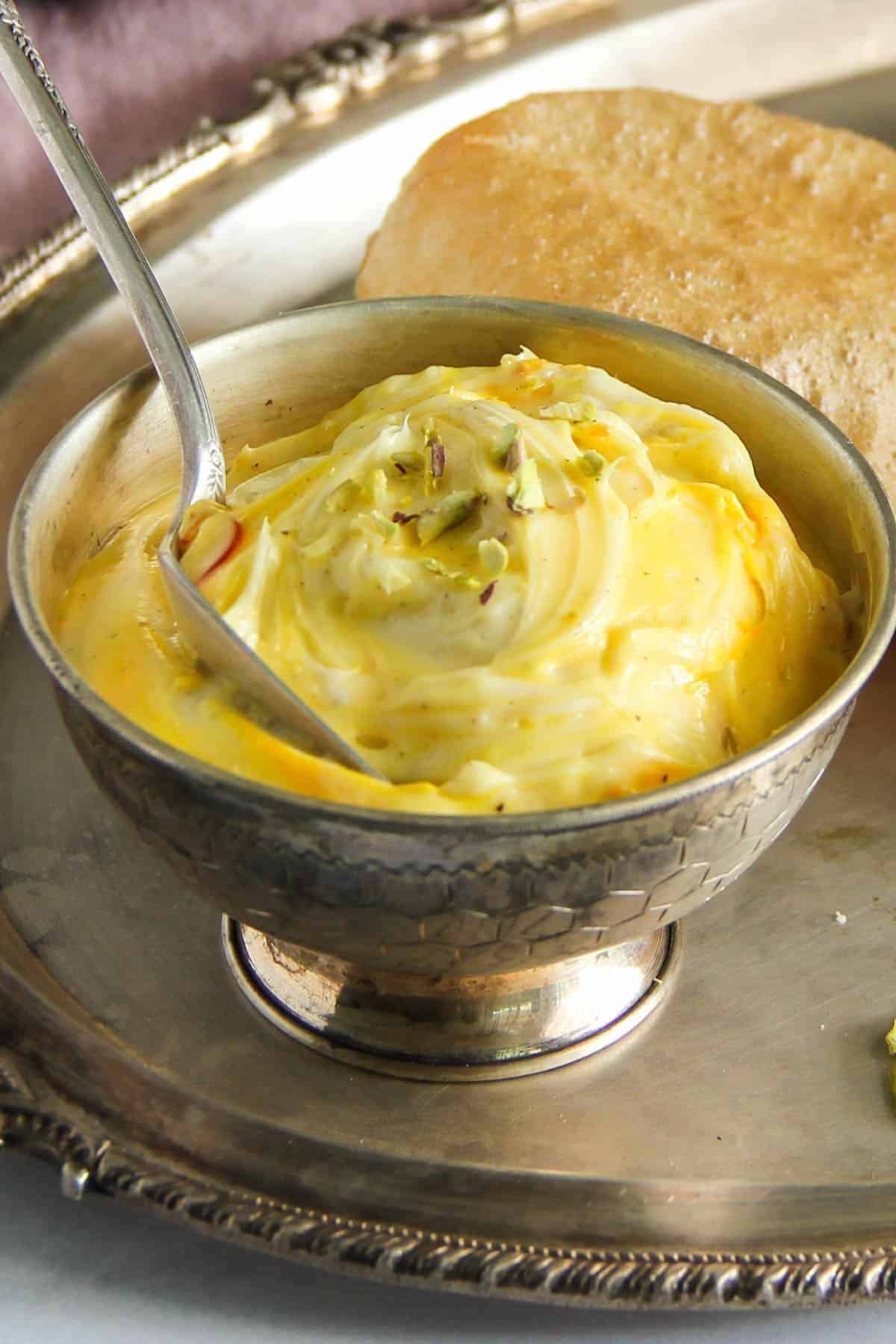 What Are the 25 Best Indian Sweets Everyone Loves? 47 Creamy shrikhand garnished with saffron and pistachios