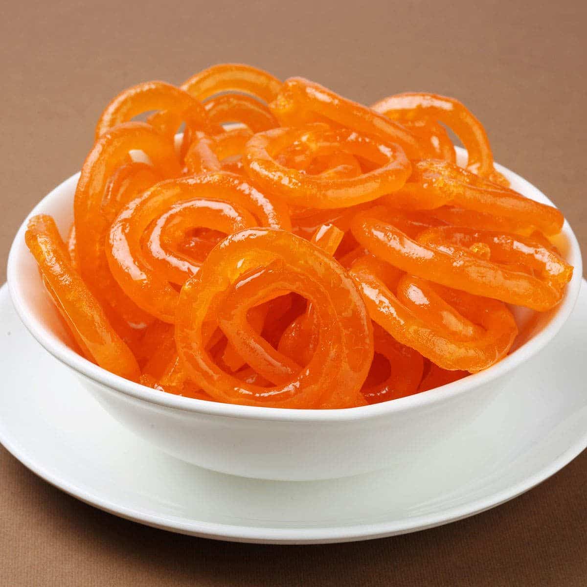 What Are the 25 Best Indian Sweets Everyone Loves? 41 Crispy jalebi soaked in saffron sugar syrup