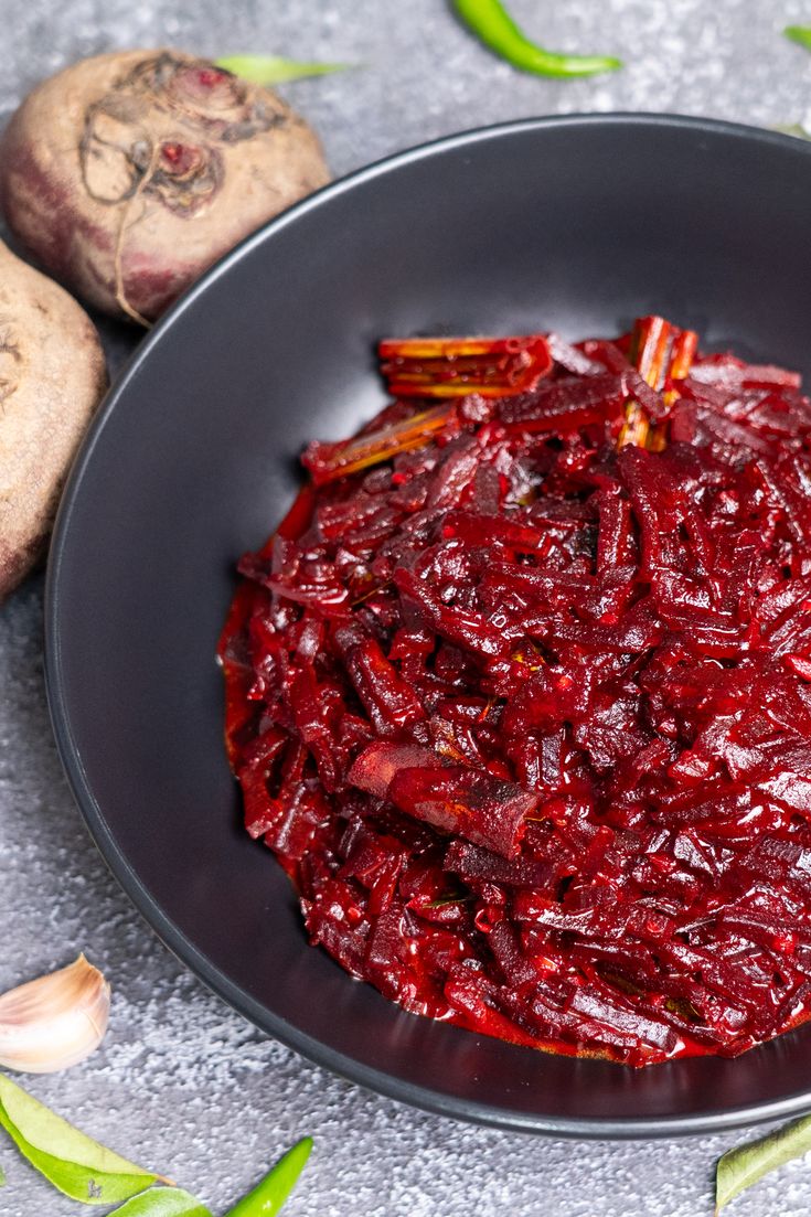 What Are the Health Benefits of Beetroot in Daily Diets? 14 Homemade beetroot curry cooked with onions tomatoes and Indian spices in a serving bowl