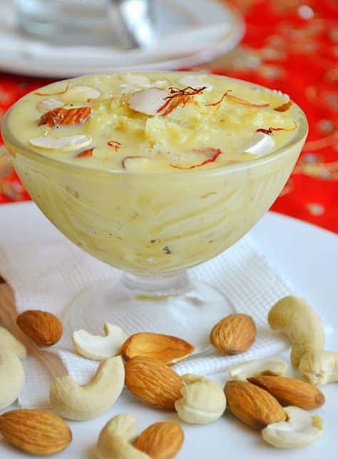 What Are the 25 Best Indian Sweets Everyone Loves? 48 Thick rabri dessert garnished with saffron and pistachios