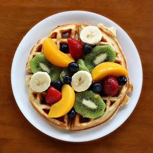 What Are the 25 Best Brunch Dishes for Weekend Meals? 50 Waffles topped with fresh fruits and syrup for a sweet brunch meal
