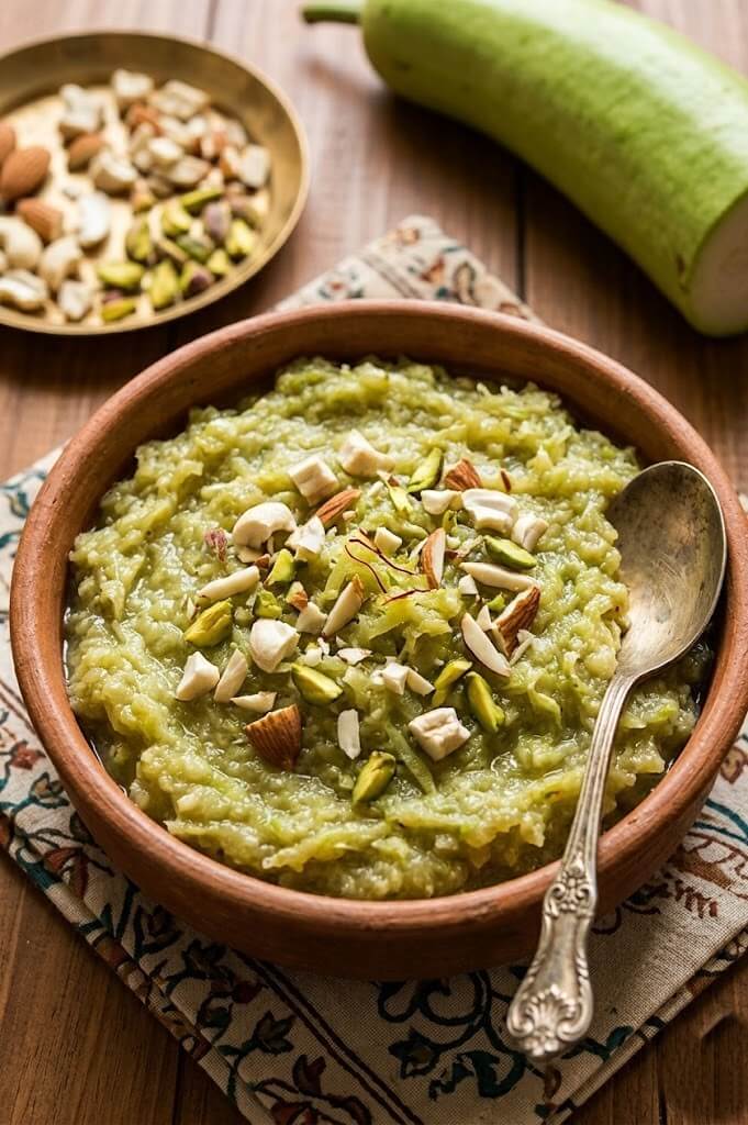 What Buddha Purnima Special Food Should You Prepare? 7 A bowl of lauki halwa garnished with almonds and pistachios made from bottle gourd as a simple Buddha Purnima sweet