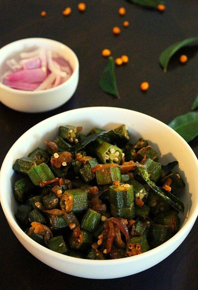 What Are Easy Summer Veggie Recipes for Light Meals? 5 Bhindi fry with sliced okra cooked with basic spices in a pan